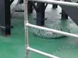 safety barrier made with steel handrails at a boat yard 